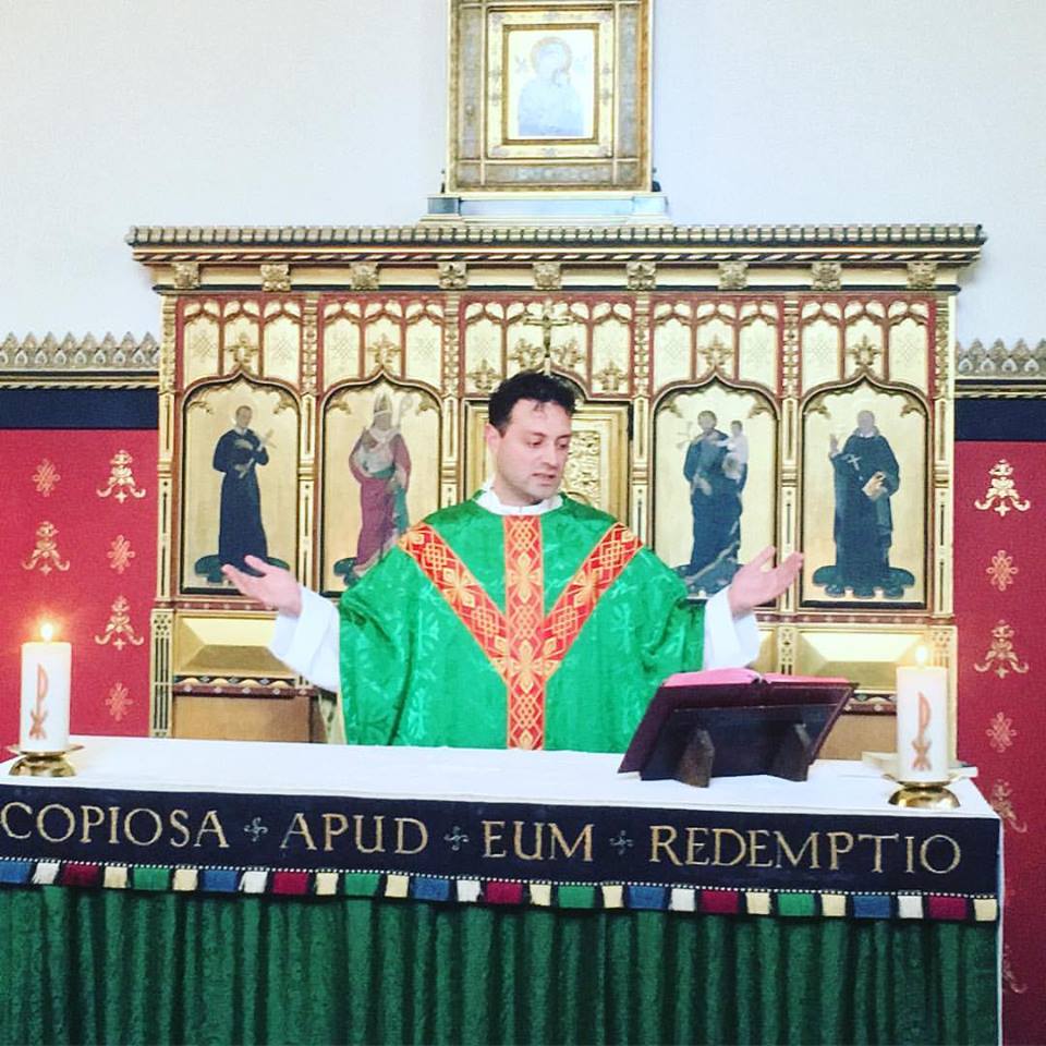 fr chalres celebrating mass